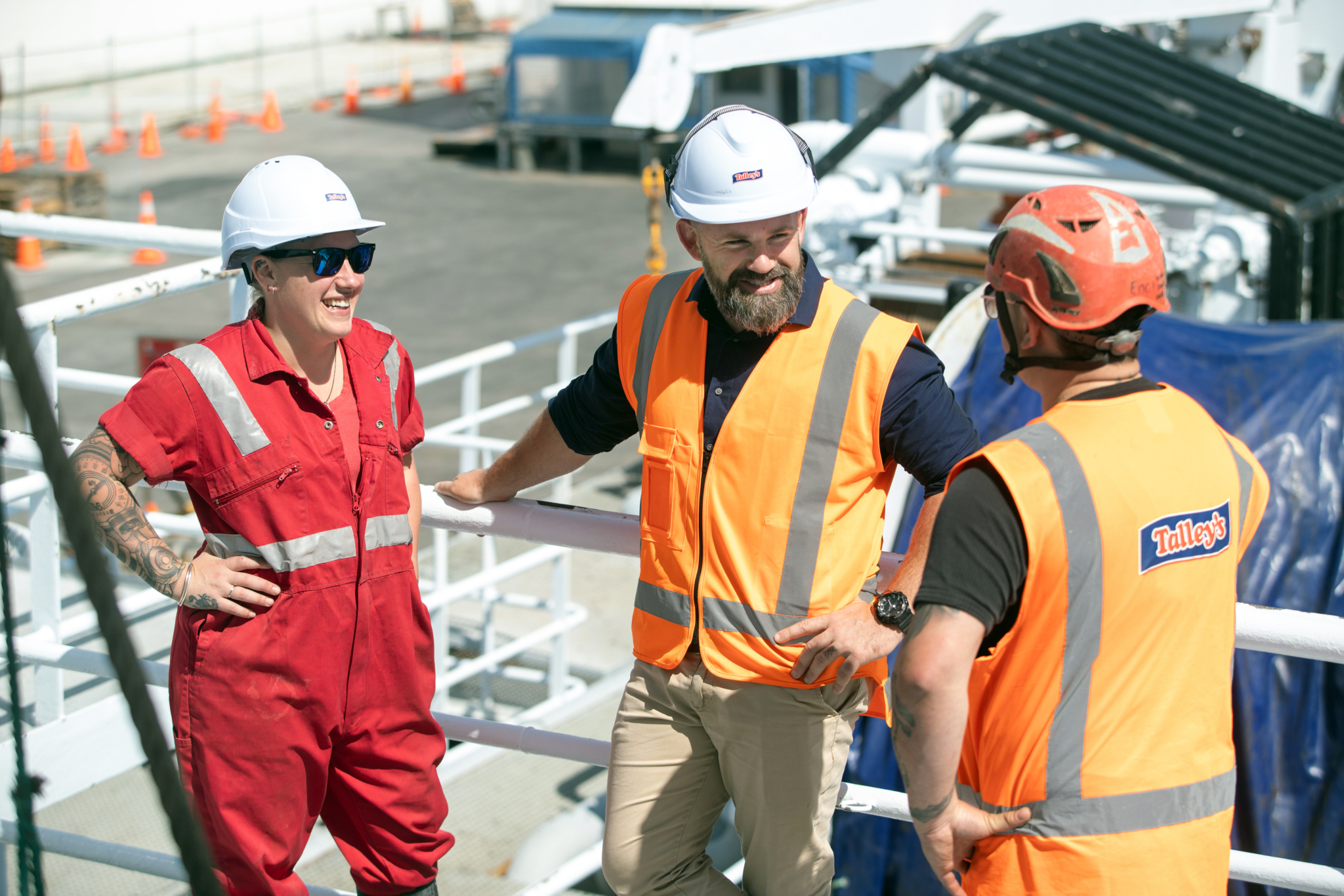 Vessel crew talk with Ben Holden (middle), head of Talley's Deep Sea fishing division